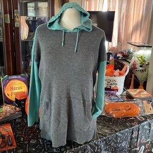 Beautiful soft hooded sweater. Gray and teal in color.